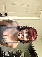 A bare-breasted elderly woman attempts to entice