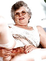 Fantastical aged bitch spreading her lips on photo