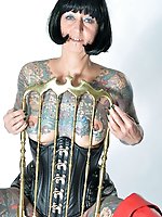 Photo shoot with full body tattooed MILF Cleo - 2