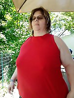 Blonde older lady is playing with her vagina