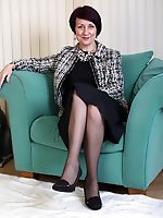 Naughty housewife stripping and teasing