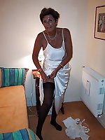 Mature momma playing with her titties