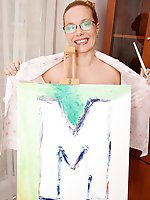 Naughty mature lady playing with paint