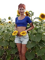 Aged girlfriend is posing undressed on the street