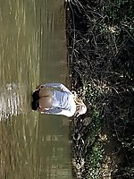 Young mature womans buttocks outdoors