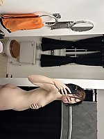 An amazing mature woman undresses in an old house